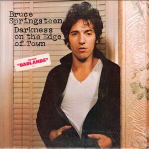 Albumhoes van Darkness on the Edge of Town van Bruce Springsteen, het sobere en intense studioalbum uit 1978.